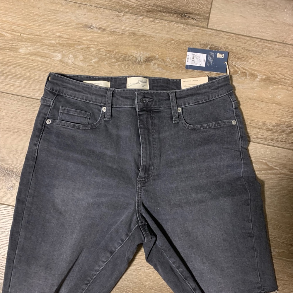 Women’s black denim shorts. 10